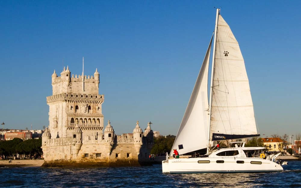 Cultural tour of monuments on a catamaran boat in Lisbon